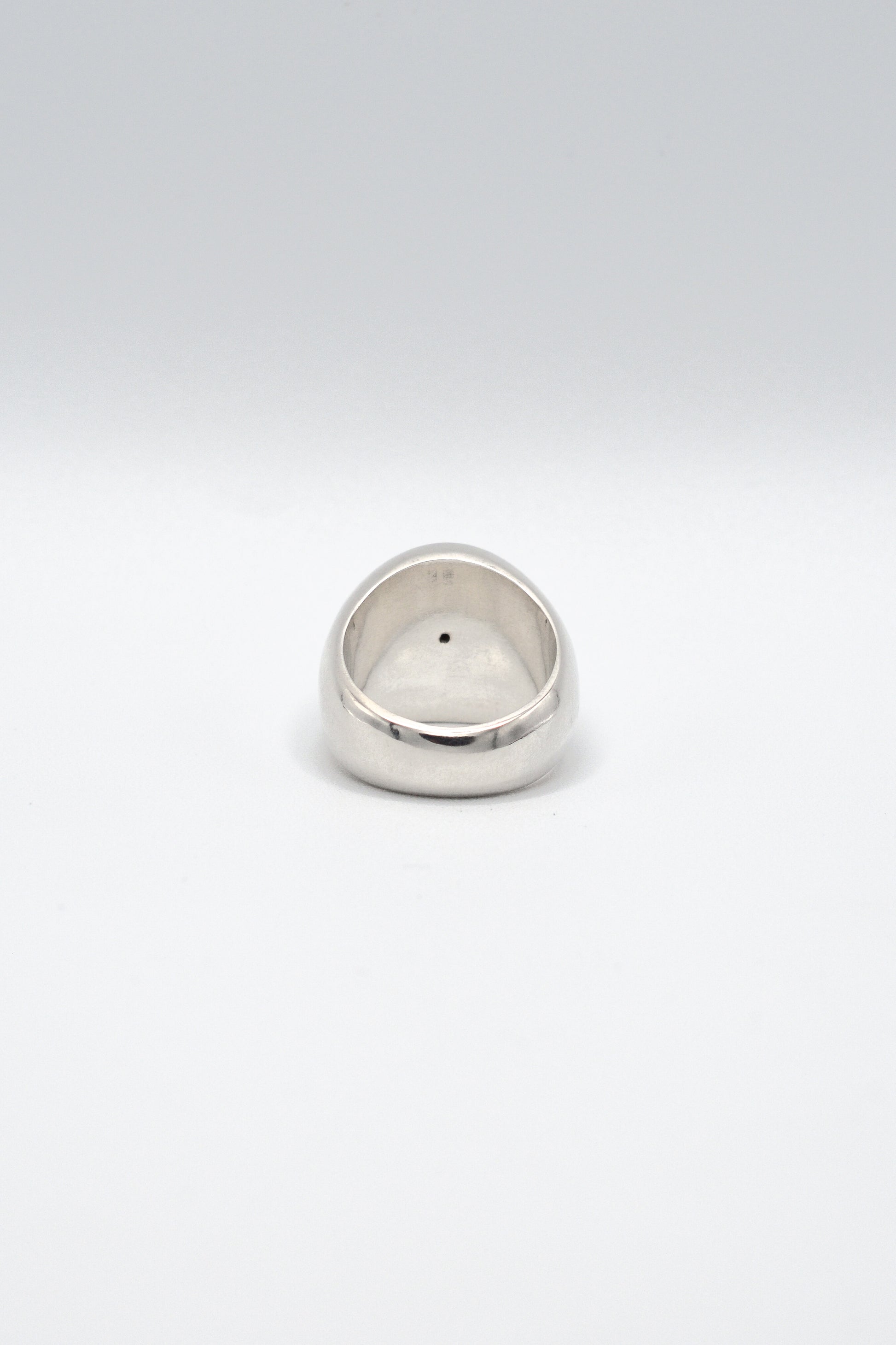 Silver ring on a white background